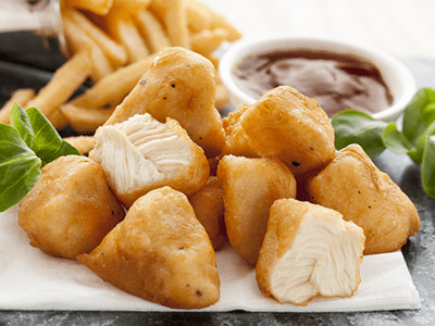 Crispy chicken bites with homemade honey BBQ sauce - Bidfood