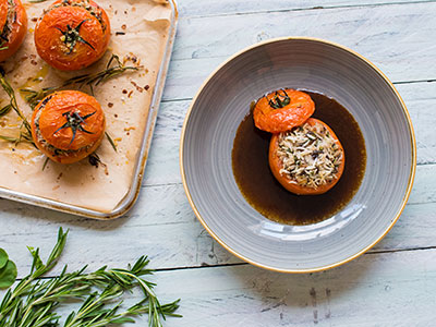 Tilda Basmati & Wild Rice Baked Tomato Recipe | Bidfood