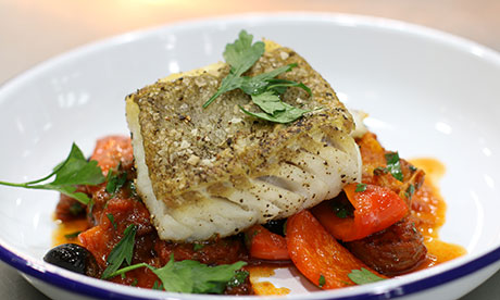 Seared cod with crispy chorizo, tomato, roasted potatoes and olives