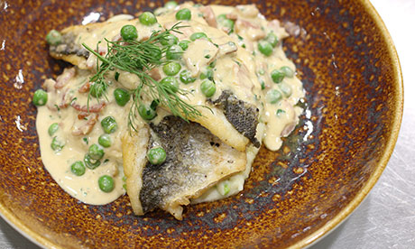 Seared seabass, pea and pancetta cream sauce & spring onion mash